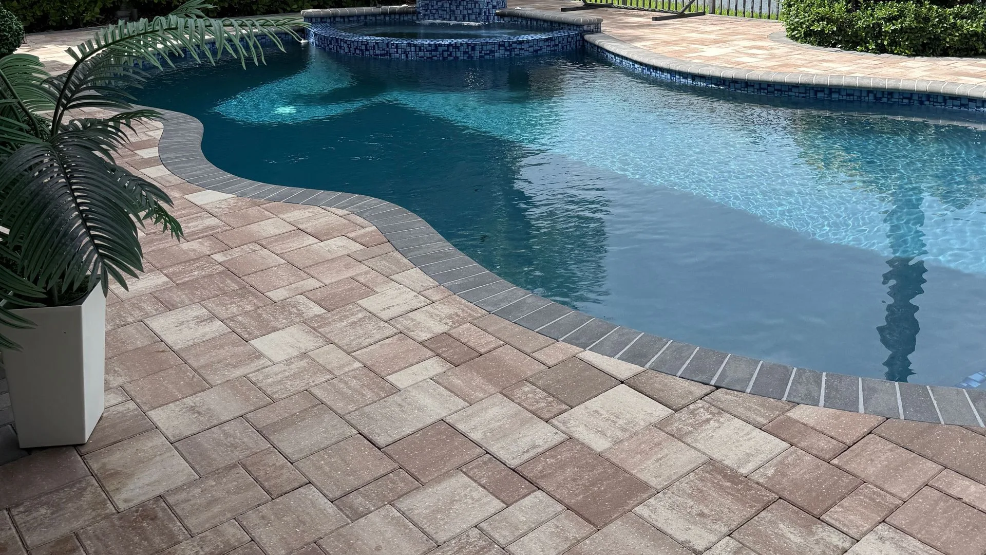 After: the same paver patio cleaned to its original color