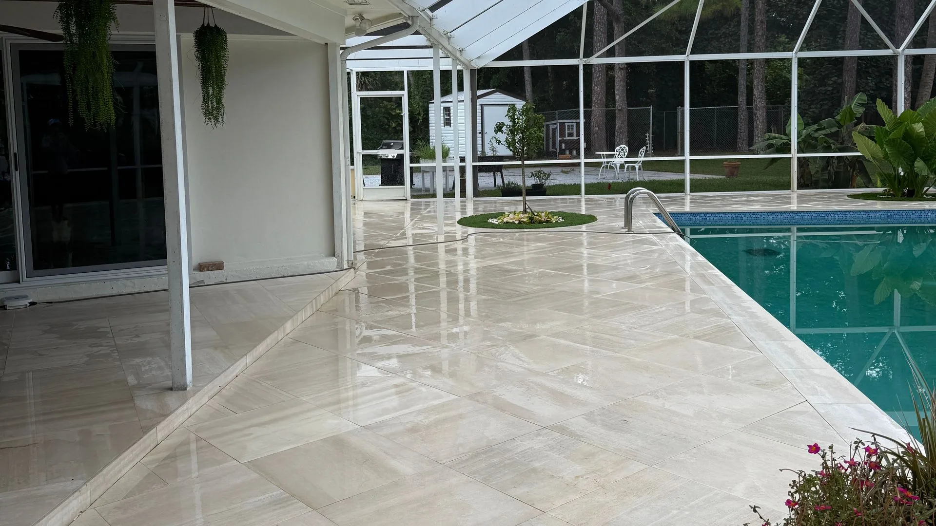 After: the same pool deck cleaned to an even, bright finish