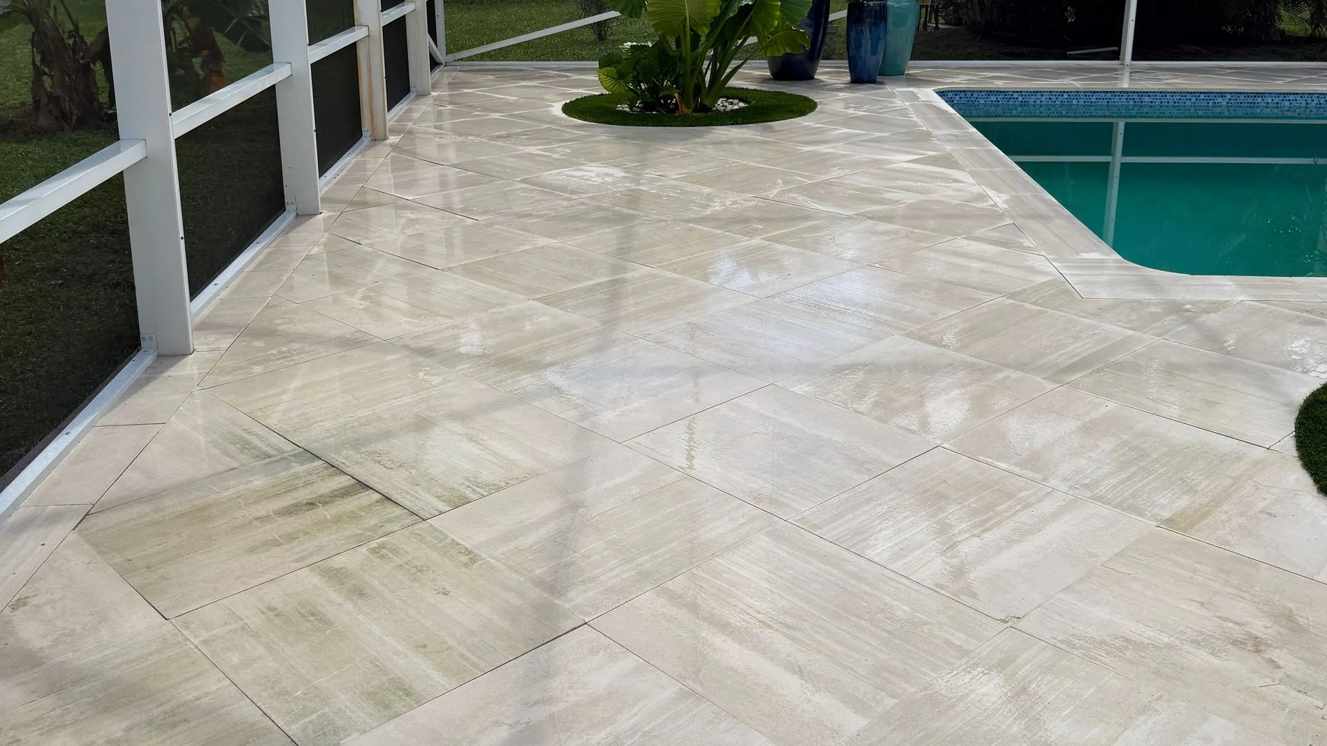 After: the pool deck restored to clean, even stone